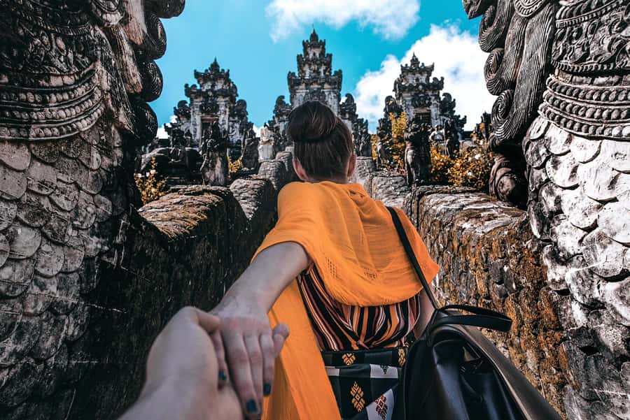 Bali: Gate of Heaven, Waterfall and Ubud All-Inclusive Tour - Tukad Cepung waterfall inside a cave: plan for wet and bring the right footwear