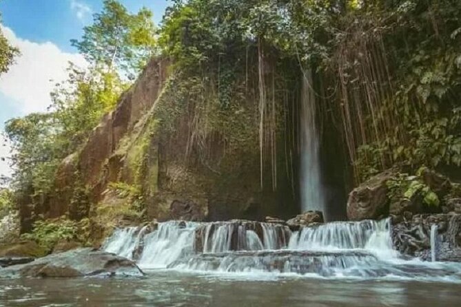 Bali Inclusive Tour: Best Waterfalls Around Ubud Area - Stop 1: Tukad Cepung’s Sun Rays in a Cave Setting