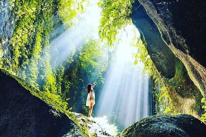 BALI INSTAGRAM TOURS; Heaven Gate, Tirta Gangga, Tukad Cepung waterfall - Tirta Gangga Water Palace: koi scenes, pools, and pavilions