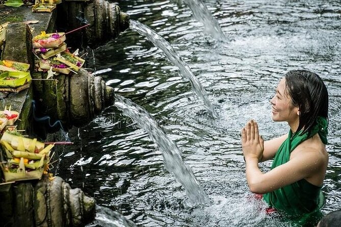 Bali Tirta Empul Tours Experience with Spiritual Cleansing - Ulu Petanu Waterfall: jungle walk, swim time, and a calmer vibe