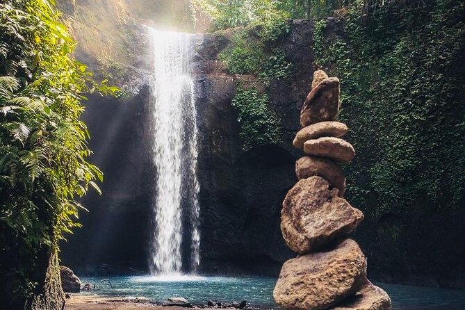 Bali: Ubud Highlights Tour with Private Guide and Transfers - Tibumana Waterfall: A 20-Metre Drop and That Clear Pool Moment