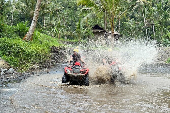 Full day Bali Adventure with Quad Bike and River Tubing - Tubing after lunch: the Ubud River float through caves