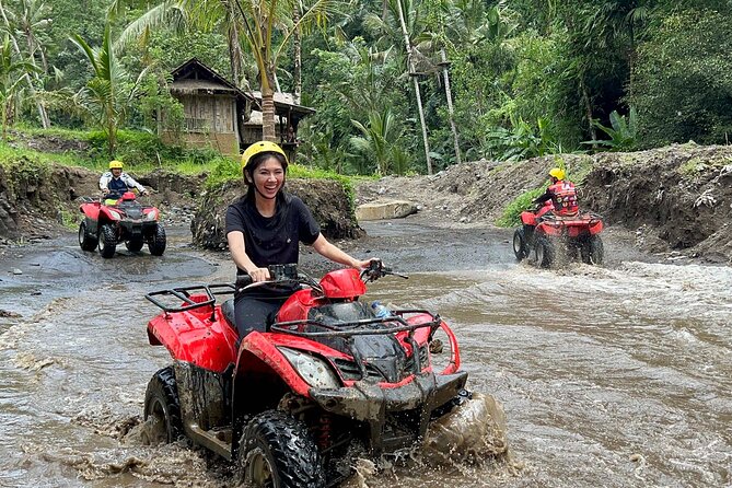 Full day Bali Adventure with Quad Bike and River Tubing - Tubing after lunch: the Ubud River float through caves