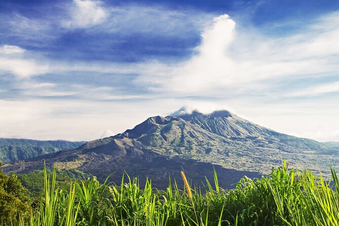 Full Day Private Guided Tour to Bali - Kintamani and Batur Volcano views: big sky, coffee breaks, and short time windows