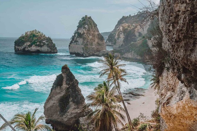 Full-Day Tour in Nusa Penida Island + Snorkeling Experience - Crystal Bay and Gamat Bay: snorkeling plus a more rugged vibe