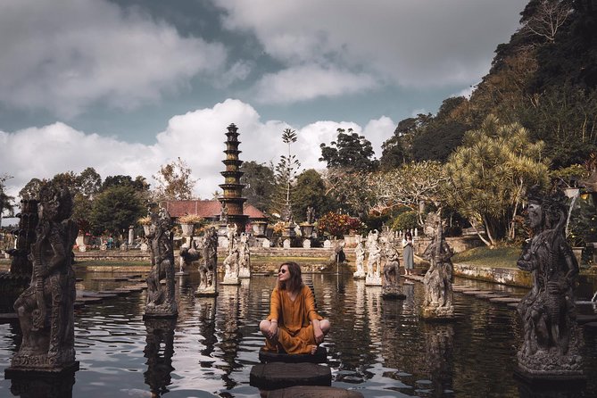 Gate of Heaven - Tirta Gangga Royal Water Palace - Tukad Cepung Waterfall - How this Ubud day tour strings together three Bali icons