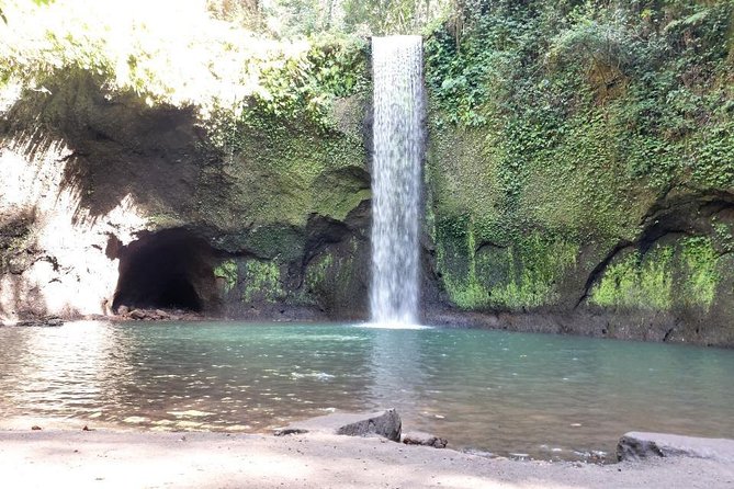 Get wet on Bali's most stunning waterfalls - Tukad Cepung: walking into the jungle to see the waterfall from inside