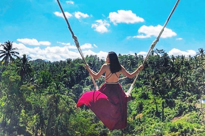 Jungle Swing - Volcano - Water Temple - Monkey Forest and Waterfall Tour - Tirta Empul Temple: sacred springs that feel more human than scenic