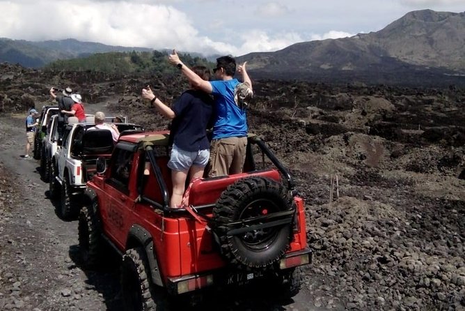 Mount Batur Jeep Sunrise & Overnight Glamping Experience - Black lava and sand fields by jeep: thrilling, not technical
