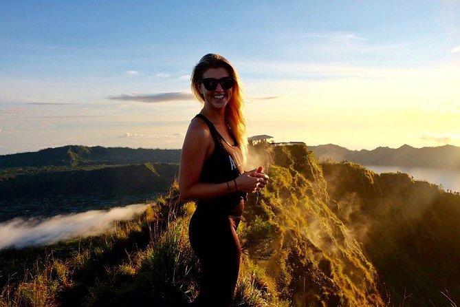 Mount Batur Sunrise Trekking With Breakfas - Climb strategy: trekking poles, flashlights, and jungle steps