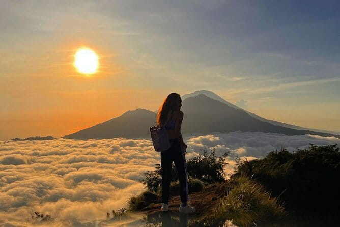 Mount Batur Sunrise Trekking with Optional Hot Spring - The dark hike to the crater rim: flashlight, poles, and footing