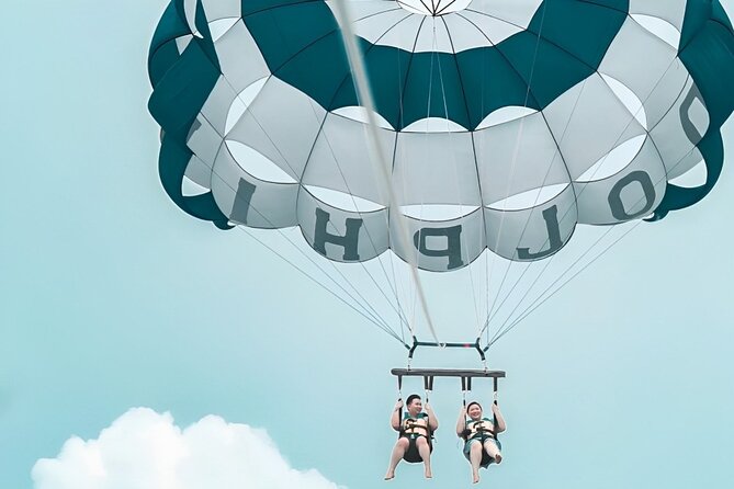 Private Bali Romantic Couple Tour with Parasailing Adventure - Tandem parasailing at Bintang Watersport: the thrill is real, the flight is short