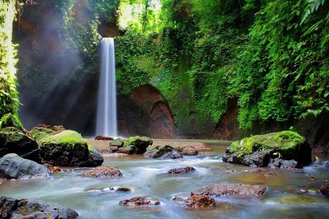 Private Day Tour To Waterfalls And Ubud Sightseeing - Kanto Lampo Waterfall: terraced rocks and easy photo access
