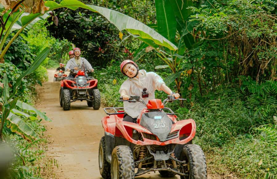 Quad Bike Bali With Tunnel & Waterfall Tour - Entering the Long Tunnel: Dark, Fun, and Very Photo-Worthy