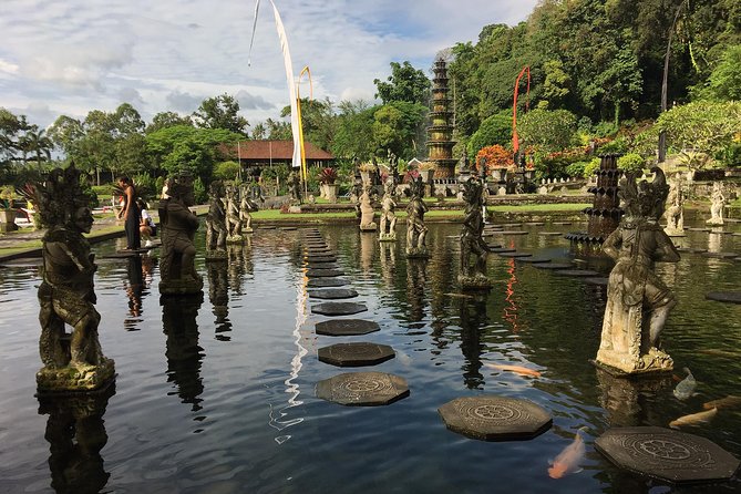 The Gates of Heavan - Ubud Jungle Swing & Waterfall Tour - Stop 2: Tirta Gangga Water Palace for calm gardens and photo-friendly pools