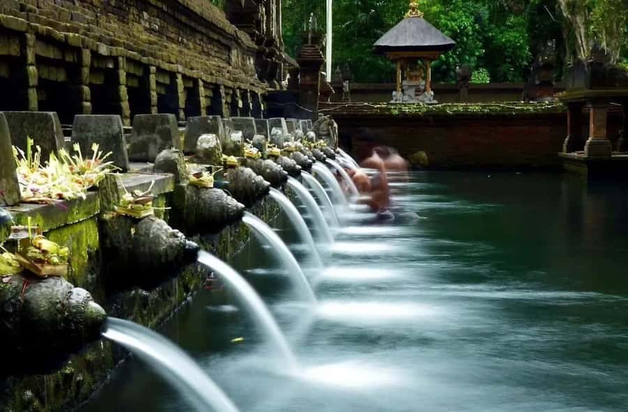 Ubud: ATV Quad Biking, Temple & Tibumana Waterfall Tour - Tibumana Waterfall: The Relaxing Pace Shift After Mud