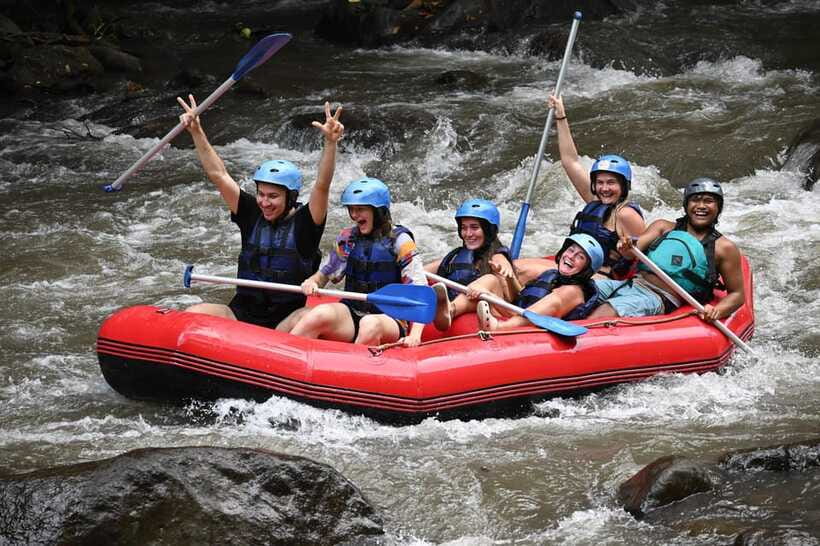 Ubud Ayung White Water Rafting Bali with Lunch - On the river: jungle view rapids, waterfall stops, and cliff moments