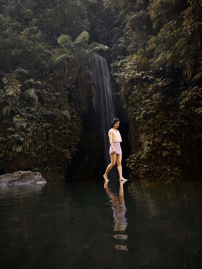 Ubud: Gorilla Face Quad Bike, Jungle Swing, Waterfall & Meal - Goa Raja Waterfall: Canyon Sun Rays and Wet-Ready Footwear