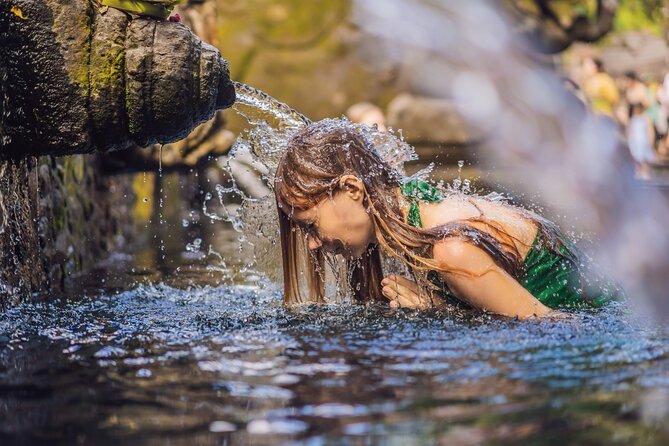 Ubud Hidden Gems Private Tour with Local Expert & Hotel Pickup - Kanto Lampo Waterfall: wading, steps, and photo angles