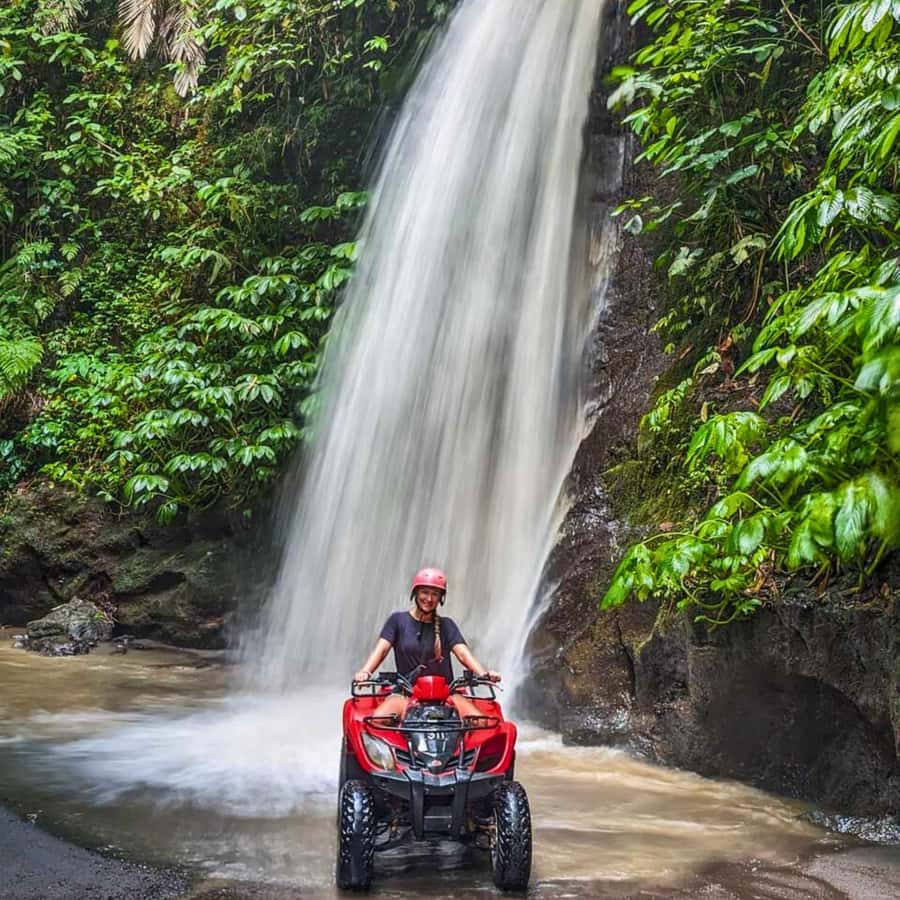 Ubud: Jungle, Waterfall, and Tunnel ATV Tour & Lunch Options - Waterfall slide time: wet thrill is part of the point