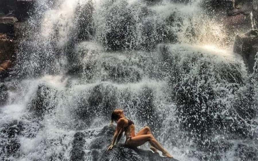 Ubud: Waterfalls, Temple & Rice Terraces Private Tour - Kanto Lampo Waterfall: wide cascades and rock-hopping photos