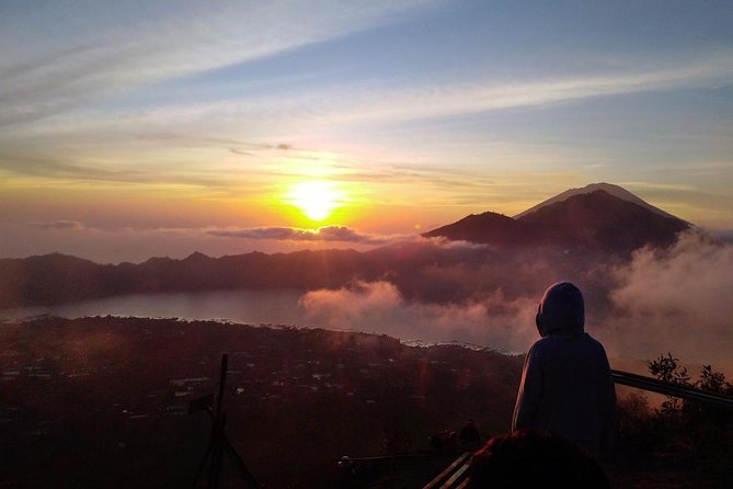 Watch the sunrise from the top of Mount Batur volcano - Hiking in the Dark: Flashlights, Terrain, and Pace